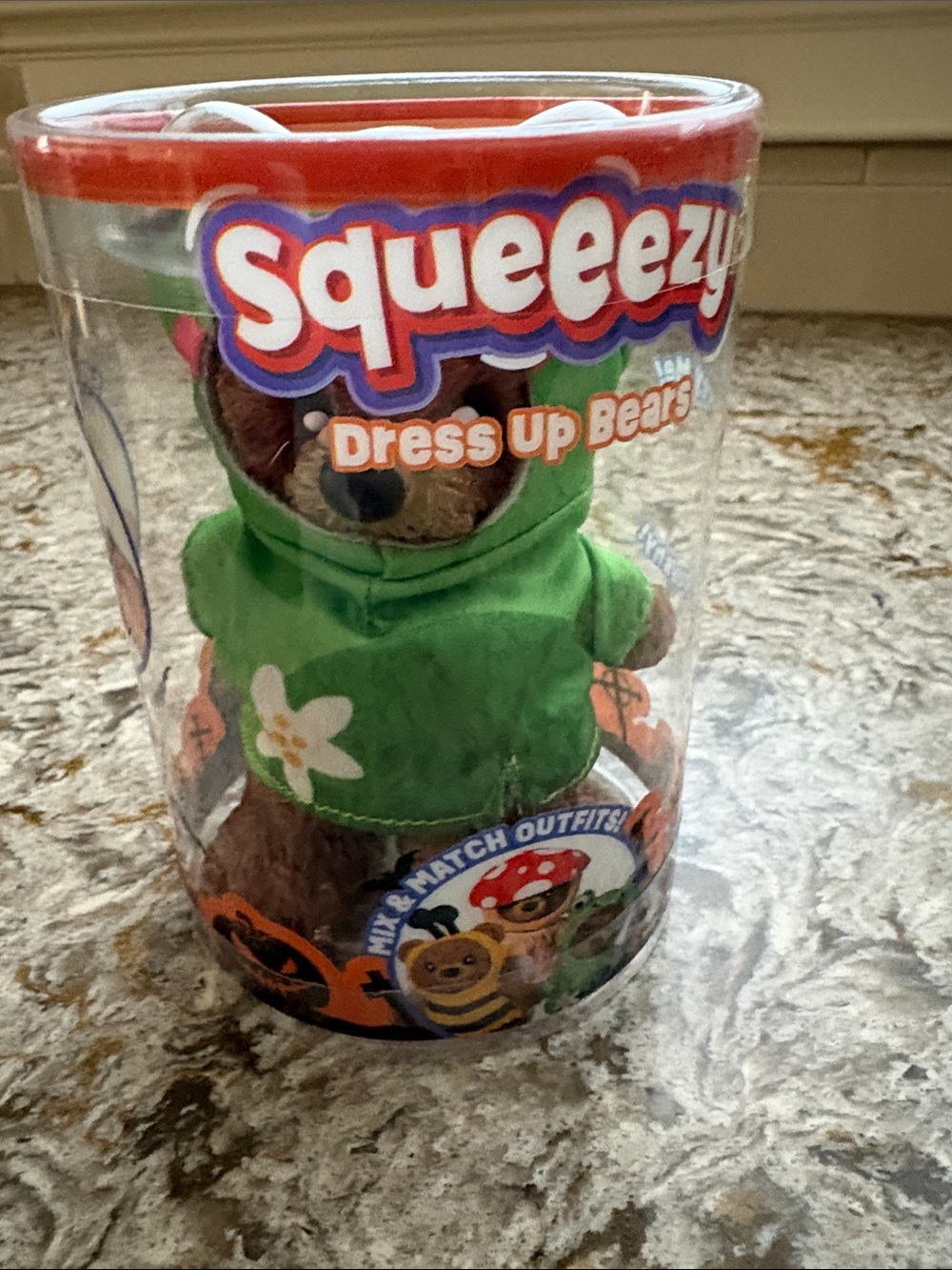 SQUEEEZY Squishy Brown Bear in Green Hoodie